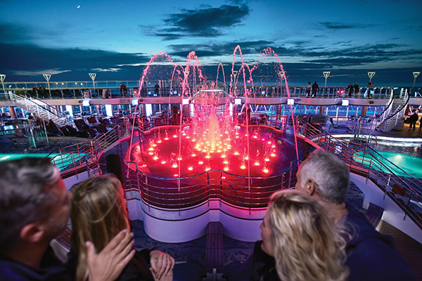 Couples watching WaterColor Fantasy water light show